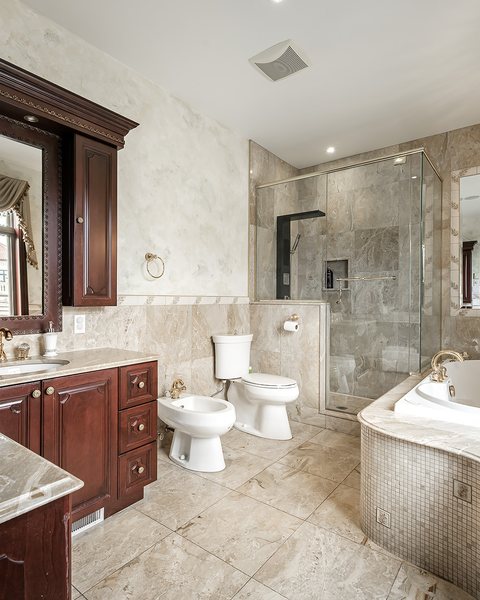 Bathroom with a glass shower and a soaking tub