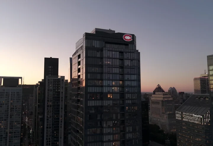 Montreal skyline at dusk with Tour des Canadiens